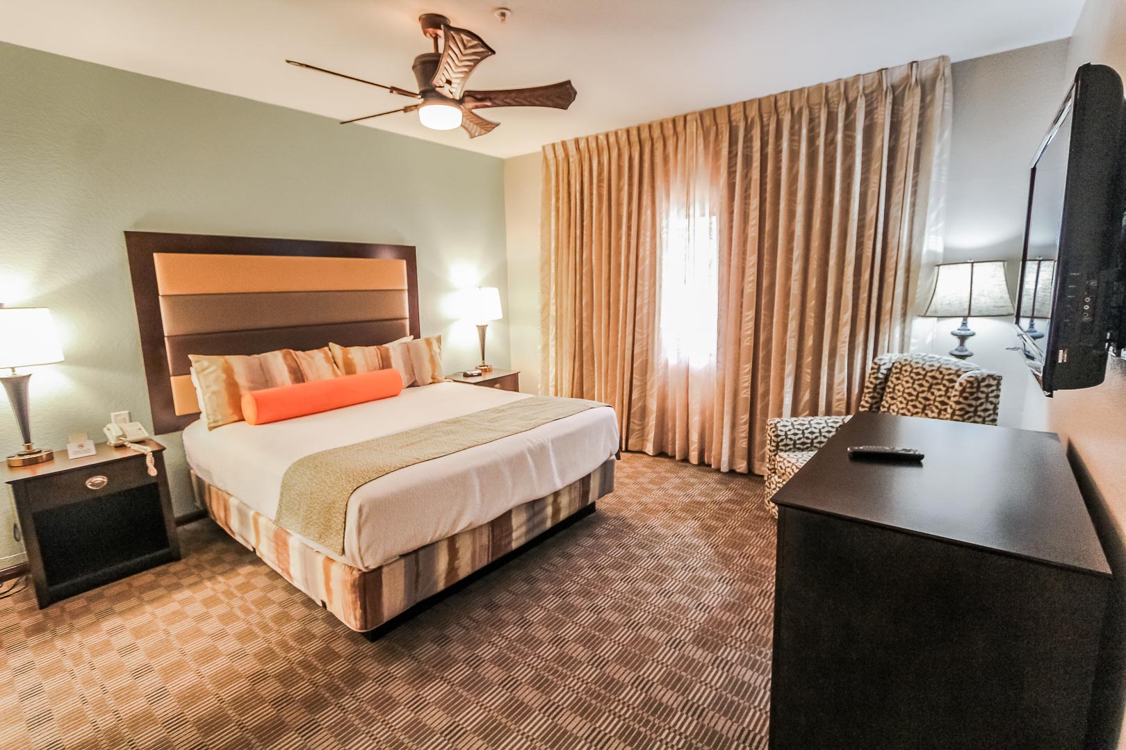 A beautiful master bedroom at VRI's Desert Isle Resort in California.